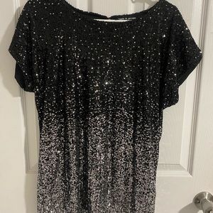 Absolutely stunning sparkly top! Size medium!